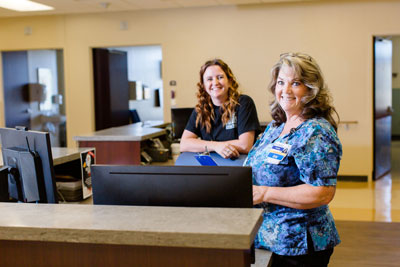 Picture of 2 of our staff members 