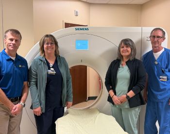 Photo of Imaging Department and CT Photo: Ed Pellicotte, Director of Outpatient Services, Christina Schuh, Sarah Kattke, and Mike Maher